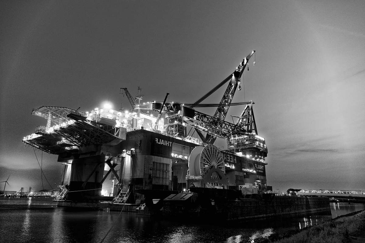 construction crane grayscale photography of oil rig offshore